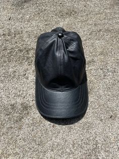 Beautifully Handmade leather hats. The perfect accessory for any outfit Leather Baseball Cap, Winston Salem Nc, Leather Hat, Tote Bags Handmade, Winston Salem, Leather Hats, Leather Cap, Drawstring Pouch, Off Black