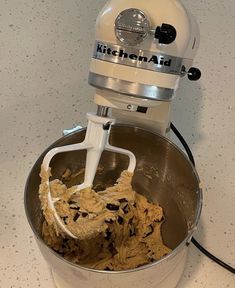 a mixer with some food inside of it