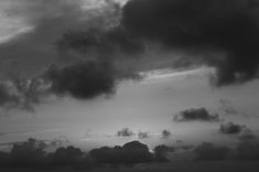 black and white photograph of clouds in the sky