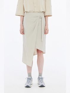 Composition : Outshell: Nylon 57%, Cotton 43% Lining: Polyester 100%Color : BeigeCountry of Origin : Republic of Korea Chic Beige Skirt For Spring, Neutral Midi Skirt For Spring, Beige Midi Wrap Skirt, Chic Beige Midi Wrap Skirt, Neutral Skirt For Spring Workwear, Beige Asymmetrical Skirt For Spring, Beige Asymmetrical Relaxed Skirt, Chic Khaki Skirt For Spring, Beige Relaxed Wrap Skirt For Work