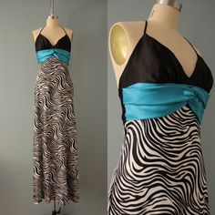 vintage beautiful designer iconic maxi gown prom party dress in zebra print bottom and empire waist with pretty halter black top and blue cummerbund ribbon. tie back on the neck. open back, zipper closure. lined in white skirt for the extra fulness. most likely for a junior wear dress. Made by Jessica McClintock  Circa 1990s Best fit size junior small,  xsmall: 32" bust 30" under-bust 40" waist/hips 51" length In excellent condition! Zebra Prom Dress, 2000s Prom Dress, Jessica Mcclintock Dress, Designer Gown, Dress Y2k, Zebra Dress, Halter Maxi Dress, Fairytale Dress, Jessica Mcclintock