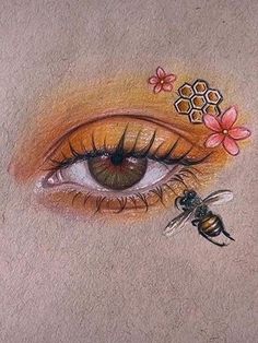 an eye with the words art sketches aesthetic on it and a drawing of a bee