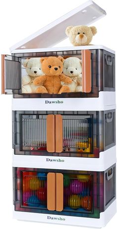 two teddy bears are sitting on top of each other in a toy storage unit that is filled with toys