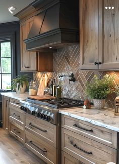 a kitchen with wooden cabinets and marble counter tops