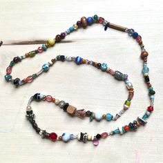 One Of A Kind Handmade Glass Bead Necklace With Vintage Y2k + 90s Beads Featuring: Vintage, Y2k/90s + Modern Beads Glass, Wood, Turquoise, Clay, Few Vinyl/Acrylic Curated Blend Of Small + X-Small Beads Chunk Scale Of 1 To 5: 1.2 Fine Quality Knotted Durable High Tenacity Nylon Cord 14.75” Drop Length 29” Total Length Brand: Www.Karlymortensen.Com Vintage + New Materials Handmade In Denver, Colorado Ready To Ship Featured With Daisy Vs Daisy Earrings - This Listing Is For Necklace Only Shop My Bo Bohemian Beaded Necklace For Everyday, Bohemian Necklace For Everyday, Artsy Colorful Beaded Necklaces For Festivals, Everyday Bohemian Beaded Necklace, Spiritual Multicolor Beaded Necklaces For Everyday, Spiritual Handmade Beaded Necklace For Everyday, Spiritual Multicolor Beaded Necklace For Everyday, Everyday Spiritual Multicolor Beaded Necklaces, Handmade Multicolor Beaded Necklaces For Everyday