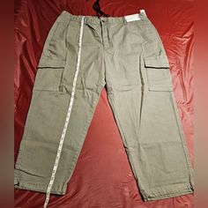 These New With Tag, Cool Big Man Cargo/Jogger In Arcadia Sage, Have The Adjustable Bungee At Each Ankle, Along With A Button, Zipper, Drawstring Waist, All In One Closure. Tag Size "40" Waist. Approx Measurements Laying Flat Waist-20=40", Front Rise=13" Inseam=26", Total Length=38" Relaxed Fit Cropped Cargo Pants With Side Pockets, Casual Cropped Leg Cargo Bottoms, Khaki Cropped Leg Pants With Pockets, Casual Cropped Cargo Style Bottoms, Baggy Cropped Leg Pants With Pockets, Casual Cropped Leg Pants With Side Pockets, Baggy Cropped Pants With Pockets, Casual Cropped Pants With Side Pockets, Casual Cropped Leg Cargo Jeans