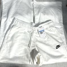 Nike Standard Fit Mid Rise Full Length Sweats. White. Size M. Nike White, Nike Pants, White Nikes, Track Pants, Nike Women, Pant Jumpsuit, Mid Rise, Full Length, Color White