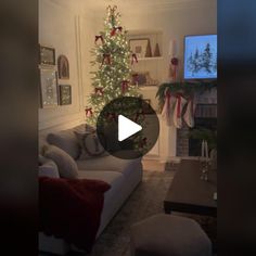 a living room with a christmas tree in the corner