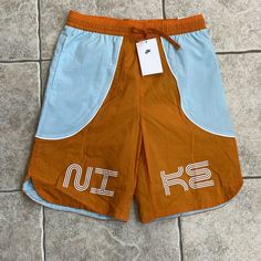 Nwt, Multiple Sizes Available. No Flaws. They Have Pockets, A Mesh Like Liner And A Drawstring. Orange Cotton Shorts For Streetwear, Multicolor Athletic Shorts With Built-in Liner, Cheap Orange Athletic Shorts With Built-in Liner, Team-colored Basketball Shorts, Blue Moisture-wicking Athletic Shorts For Streetwear, Boys Nike, Kids Nike, Kids Bottoms, Nike Sportswear