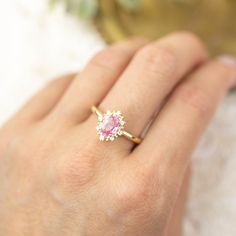 This is made to order ring. Beautiful unheated pink sapphire from Madagascar, weight ranges from 0.60 to 0.7ct, 7x5mm, eye clean 0.08ctw., G color SI clarity accent diamonds Band width: approx. 1.9mm High profile setting, easy stacking with a straight band Made of recycled solid 14k gold Our Dedication All our jewelry is designed and created by Kat with great attention to details and the entire production from casting, stone setting to finishing takes place in New York, USA. All gemstones used i Custom Sapphire Engagement Ring, Peach Sapphire Rings, Pink Sapphire Engagement Ring, Ivory Ring, Purple Sapphire Ring, Pink Sapphire Ring Engagement, Green Sapphire Ring, Yellow Sapphire Rings, Pink Sapphire Ring