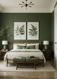 a bedroom with green walls and white bedding