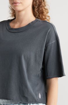 Whether you're warming up or cooling down on the pickleball court, you'll love rocking the boxy, slightly cropped fit of this all-cotton T-shirt. 20" length" (size Medium) Crewneck Elbow-length sleeves 100% cotton Machine wash, tumble dry By Free People; imported Basic Washed Black Crew Neck Top, Soft-washed Cropped T-shirt For Streetwear With Crew Neck, Soft-washed Crew Neck Cropped T-shirt For Streetwear, Relaxed Washed Black Cotton Top, Relaxed Fit Washed Black Crew Neck Top, Washed Black Relaxed Fit Crew Neck Top, Black Graphic Cropped T-shirt Relaxed Fit, Relaxed Fit Washed Black Short Sleeve Tops, Black Relaxed Fit Cropped Graphic Tee