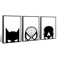 three black and white wall art depicting superheros