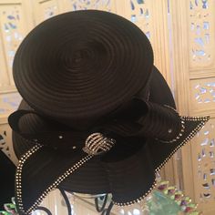 Perfect For Any Occasion, Especially Opening Day At The Races. Classy And Elegant. 100% Polyester. The Special Details Of The Rhinestones And The Ribbon Like Design Make It A Must Have In Your Hat Collection. It Can Be Adjusted To Your Size. Elegant Evening Hats With Rhinestones, Black Evening Hat With Rhinestones, Black Evening Hats With Rhinestones, Black Adjustable Embellished Hats, Black Hat With Rhinestones For Evening, Formal Fitted Embellished Hat, Adjustable Black Hats With Rhinestones, Adjustable Black Hat With Rhinestones, Elegant Black Hats With Rhinestones