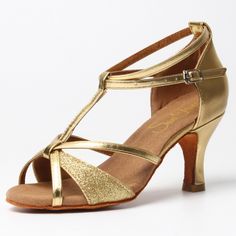 Step into elegance with our gold dance shoes, designed to shine on any stage. Whether you're gracing a wedding aisle or owning the dance floor with Salsa, Bachata, or Kizomba, these shoes guarantee not only style but unmatched comfort. Features: Material: Crafted from glossy patent leather, adding a touch of luxury. Sole: Premium suede superfibre, ideal for Latin and Ballroom dance moves. Heel Height: A poised 7cm (approximately 2.75 inches). Quick Release Buckles: High-quality dance buckles for Gold Closed Toe Sandals For Formal Occasions, Gold Closed Toe Sandals For Gala, Gold High Heel Dance Shoes For Party, Gold Heels With Round Toe, Elegant Closed Toe Dance Sandals, Adjustable Round Toe Dance Shoes For Party, Gold Ankle Strap Wedding Shoes For Gala, Gold Open Toe Wedding Shoes For Formal Occasions, Gold Fitted Sandals With Almond Toe