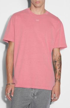 Relaxed and faded to old-favorite perfection, this cotton T-shirt sports signature 4x4 cross graphics on the back and a knotted rats tail dangling at one hip. 29 1/2" length Crewneck Short sleeves 100% cotton Machine wash, line dry Imported Pink Washed Short Sleeve T-shirt, Streetwear Washed Pink Tops, Soft-washed Pink T-shirt For Streetwear, Pink Soft-washed T-shirt For Streetwear, Pink Washed Graphic Tee T-shirt, Pink Washed Graphic Tee, Pink Washed Crew Neck T-shirt, Red Fits, Fabric Gifts