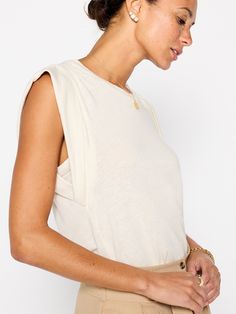 Chic Linen Tops For Layering, Linen Crew Neck Top For Layering, Fitted Summer Tops With Dropped Armholes, Chic Tops With Padded Shoulders For Spring, Chic Everyday Tops With Scoop Back, Versatile Crew Neck Muscle Tee For Everyday, Crew Neck Linen Tops For Layering, Spring Tops With Relaxed Fit And Dropped Armholes, Cotton Scoop Back Top For Summer