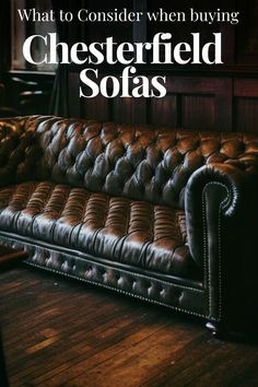 a leather couch sitting on top of a wooden floor next to a wall with the words, what to consider when buying chesterfield sofas