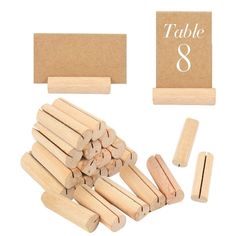 wooden pegs and place cards on white background with clipping for table number 8