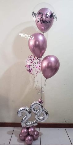 some balloons that are in the shape of numbers