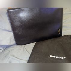 Saint Laurent Leather Clutch Bag( Black) Great Condition Designer Clutch For Daily Use, Designer Rectangular Pouch For Formal Occasions, Modern Business Pouch With Dust Bag Included, Luxury Rectangular Office Pouch, Designer Rectangular Clutch For Everyday Luxury, Designer Everyday Luxury Rectangular Clutch, Designer Clutch Pouch, Designer Clutch For Formal Events, Designer Clutch With Dust Bag For Travel