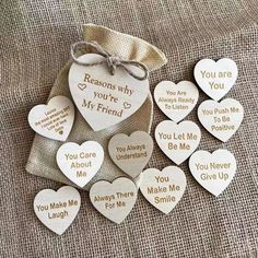 wooden hearts with the words, you are my friend and some sayings on them