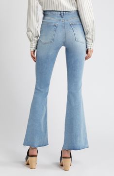 Raw hems relax the style of mid-rise flare jeans made from soft, lightweight stretch denim in a casual medium wash. 31" inseam; 21" leg opening; 11" front rise; 15" back rise (size 29) Zip fly with button closure Five-pocket style 63% organic cotton, 27% cotton, 5% recycled polyester, 5% elastane Machine wash, dry flat Imported Fall Mid-rise Rigid Denim Flare Jeans, Blue Mid-rise Flare Jeans With Contrast Stitching, Mid-rise Flare Jeans With Contrast Stitching In Medium Wash, Mid-rise Distressed Rigid Denim Flare Jeans, Mid-rise Rigid Denim Flare Jeans With Five Pockets, Mid Rise Flare Jeans, Men Home Decor, Hairstyling Products, Rollerball Perfume