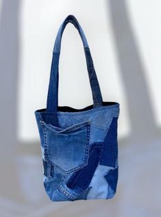 a handbag made out of old blue jeans