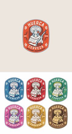 four different colored badges with an image of a man holding a baseball bat and wearing a hat