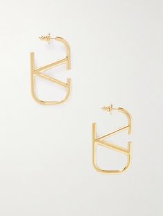 Valentino Garavani was a pioneer of designer emblems, first adorning one of the brand's belts with a 'V' shape in 1968. These earrings are cast from polished gold-tone metal in the form of the brand's contemporary 'VLOGO'. Branded Belts, Fashion Jewelry Earrings, Metal Earrings, Pricing Jewelry, Gold Tone Metal, Metal Jewelry, V Shape, Valentino Garavani, Crystal Earrings