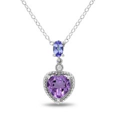 Add a little romance to your style with this adorable amethyst, tanzanite, and diamond drop pendant. Crafted in sterling silver, this pendant boasts an oval, violet tanzanite from which drops a heart shaped, purple amethyst crowned with a small, round accent diamond. The pendant measures 19mm in length, the tanzanite measures 5x3mm, and the amethyst measures 7x7mm. Included is a sterling silver 18" cable chain with a spring ring closure. Amethyst Jewellery, Diamond Drop Pendant, Tanzanite Pendant, Diamond Heart Pendant Necklace, Sterling Silver Heart Pendant, Tanzanite Diamond, Diamond Jewelry Necklace, Jewelry Pendants, Silver Heart Pendant