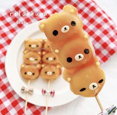 there is a plate full of bear shaped lollipops