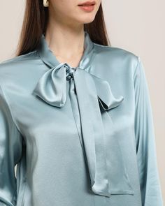 Type: One Piece Pure Silk Bow Elegant ShirtMaterial: 100% 22Momme Charmeuse Silk. Features: Satin, wear-resistant and stylish. Model Wear: S (Height:173cm / Bust: 82cm / Waist: 59cm / Hips: 89cm).Details:Daisysilk’s shirt will make lazy workday mornings a little bit more luxurious. The relaxed fit won't feel restrictive when you're outing. SIZE: CM / INCH SIZE Bust Sleeve Shouder Length XXS 92/ 36.22" 57/ 22.44" 38/ 14.96" 66/ 25.98" XS 96/ 37.8" 58/ 22.83" 39/ 15.35" 67/ 26.38" S 100/ 39.37" 59 Bow Tie Blouse, Silk Bow Ties, Silk Bow, Plain Shirts, Tie Blouse, Mens Pajamas, Kids Pajamas, Silk Shirt, Mulberry Silk