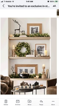 a living room filled with furniture and christmas wreaths on the wall above it's shelves