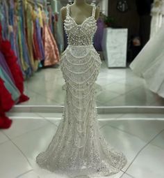 Glamorous Prom Ball Gown With Long Train, Embellished Ball Gown For Prom Pageant, Embellished Ball Gown Pageant Dress For Prom, Elegant Ball Gown For Prom And Pageant, Luxury Evening Dress For Wedding And Prom Season, Bedazzled Prom Gown, Elegant Rhinestone Mermaid Dress For Wedding, Elegant Bedazzled Evening Dress For Wedding, Glamorous Ball Gown With Detachable Train For Parties