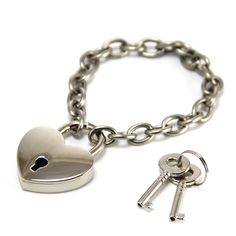 This heart lock and chain bracelet is a real working lock with 2 sets of keys. Wear as a bracelet, or use as a key chain. The lock is the closure for the bracelet. The lock itself measures 1.25" across, 1.5" from top to bottom, and is .25" thick. (4cm high x 3cm wide). The chain is stainless steel and the lock is nickel plated brass. 7" (18 cm) bracelet made of 304 Stainless Steel Chain (2.0x11x8mm) with working plated brass heart lock closure. Fits up to a 7.5" wrist. Lock Bracelet, Black Hills Gold Jewelry, Padlock Necklace, Heart Padlocks, Heart Lock, Grey Style, Black Hills Gold, Beating Heart, Jewelry Kits