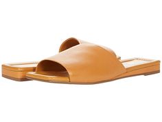 Franco Sarto Bordo by SARTO - Women's Shoes : Tan : The Franco Sarto® Bordo by SARTO is a trend-savvy style you'll want to wear every day. This slide sandal is crafted with a leather upper, and designed with a wide strap and a square toe. Slip-on styling. Man-made lining. Lightly padded footbed. Man-made sole. Imported. Measurements: Heel Height: 1 4 in Weight: 7 oz Product measurements were taken using size 8.5, width M. Please note that measurements may vary by size. Weight of footwear is base Classic Slip-on Slides For Summer, Modern Single Toe Strap Slides For Summer, Modern Summer Slides With Single Toe Strap, Modern Slides With Single Toe Strap For Summer, Classic Single Toe Strap Mules For Spring, Classic Spring Mules With Single Toe Strap, Classic Flat Slides For Spring, Classic Slides With Leather Footbed For Spring, Classic Slide Mules For Spring