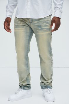 Available In Medium Wash. Slim Fit Stretch Denim 82% Cotton 16% Polyester 2% Spandex Disclaimer: Rhinestone Placement Will Vary. Disclaimer: Due To The Specialized Distressing & Wash Process, Each Garment Is Unique. Zip Fly Button Closure 5 Pocket Detail Beaded Stud Detail Imported | Mens Party Like A Rockstar Slim Jeans in Medium Wash size 36 by Fashion Nova