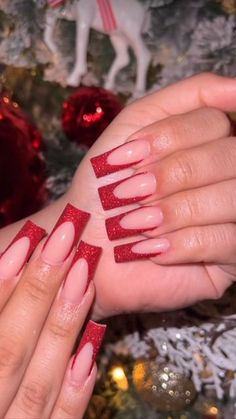 Red French Tip Birthday Nails, Dark Red Glitter French Tip Nails, Red Nail Designs Sparkly, Red French Tip Nails With Silver Line, Christmas Acrylic Nails Holiday Long, Red French Tip With Initial, Red Glitter French Tip Nails Christmas, Red French Glitter Nails, Festive Christmas Nails Red