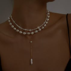 A matching necklace to our best-selling Viviana pearl bracelet has finally arrived! Featuring a trendy yet classic Freshwater pearl beaded necklace with dainty gold beads to glisten together. This beautiful necklace can be worn on its own or layered as a choker with pendant necklaces and chains. There's also an option to add a 2-inch extender chain so you can easily adjust the length.  We use natural freshwater pearls to craft this item where there's a slight difference in the shape and size of each pearl. Just as no two pearls are identical, there's no one else quite like you in this world. Gold-filled jewelry is safe to wear in water, excluding hot tubs, swimming pools, and the ocean as the chemicals and salt can damage the jewelry. Please remove your jewelry before exercising, putting o Luxury Pearl Necklace, Pearl Outfit Classy, Back Necklace Wedding, Trendy Beaded Necklace, Pearl Necklace Layering, Pearl Necklace Layered, Pearl Necklace Outfit, Choker With Pendant, Pearl Bead Necklace