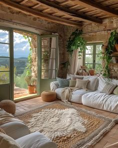 a living room filled with lots of furniture next to a window covered in greenery