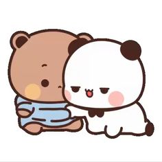 a brown bear hugging a white teddy bear