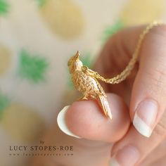 PLEASE NOTE: SOLID GOLD HAS A 3-4 WEEK LEAD TIME. This cute little cockatiel pendant is cast in solid sterling silver and finished by hand, and was created from my original hand-sculpted cockatiel design as shown in the photographs above. This necklace is also available plated in 18 carat gold or Solid 9 carat gold, but bear in mind that these take longer to make. Please note that the lead time estimates provided in the 'Delivery and Returns' section below are based on an order for a sterling si Mini Animals, Pendant Sets, Harajuku Outfits, Mini Dolls, Wear Necklaces, Handmade Gold, Wire Earrings, Silver Pieces, Gorgeous Necklaces