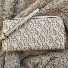 The Gorgeous Coach Is New Never Used In Excellent Condition. The Tags Have Came Off The Plastic But Are Inside The Wallet. This Can Be Used As A Wallet, Wristlet Or Clutch. The Wristlet Strap Is Removable. This Is The Long Zip Around. Trendy Beige Clutch Wristlet, Trendy Beige Pouch Wallet, Coach Beige Wristlet With Zipper Closure, Beige Coach Wristlet With Zipper Closure, Coach Beige Everyday Wallet, Coach Cream Wallet With Zipper Closure, Coach Beige Clutch Wallet, Beige Wristlet With Zipper Closure For Daily Use, Coach Cream Pouch Wallet