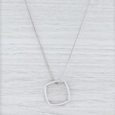 Gem: Natural Diamonds - 0.20 Total Carats, Round Brilliant Cut, F - G Color, VS ClarityMetal: 18k White GoldWeight: 19.2 Grams Stamps: 750 Tiffany & Co Gehry Style: Snake ChainClosure: Lobster ClaspChain Length: 18"Width: 1.2 mmPendant dimensions: 26 mm Each piece is thoroughly examined and refinished as needed by our professional jewelers, graded by our in-house GIA (Gemological Institute of America) Graduate Gemologist, and inspected for quality before being carefully packaged and promptly Anniversary White Gold Necklace With Square Pendant, Modern Necklace With Diamond Accents As A Gift, Modern Necklace With Diamond Accents For Gift, White Gold Square Pendant Necklace For Anniversary, Modern Pave Setting Jewelry As A Gift, Sterling Silver Box Chain Necklace For Wedding, Modern Sterling Silver Necklaces With Diamond Accents, Anniversary Necklace With Square Pendant And Box Chain, Anniversary Box Chain Necklace With Square Pendant