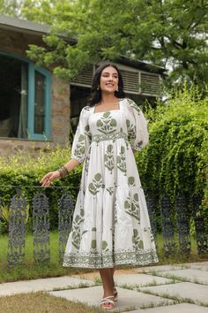 This unique handblock print is the highlight of this dress, along with the stylish square neck and boho puff sleeves! Using the best quality cotton fabric along with the lovely combination of white and green floral motifs, this dress makes for a perfect wear at any outing, casual or dressy .Pair it with lacy sandals or comfy flats, the MIDI length is perfect to move around with ease.Its vintage ,boho chic feel makes it royal and gives an old world charm. Block print cotton dress also features 3/4th sleeves. Model is wearing size S Size chart in PICS.Size chart attached in images mentions garment measurements in inches . if confused between sizes,we suggest to size up since cotton fabric doesnt stretch. Sundress Women, Midi Dress Floral, Summer Midi Dress, Ethnic Motifs, Comfy Flats, Handmade Dress, Printed Cotton Dress, Midi Dress Summer, Indian Cotton