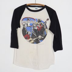 Original 1979 Fleetwood Mac The Tusk Tour Jersey Shirt. This is a true vintage shirt, not a modern reproduction. Sizes vary so please use measurements for best idea on fit. Front and back graphics. Shirt is in good condition, no holes, discoloration on front. This shirt comes laundered and ready to wear. Tag Size: Medium Material: 100% Cotton Pit to Pit: 17.25 inches Collar to Hem: 26.25 inches Vintage Band Tees, Fleetwood Mac, Vintage Band, Vintage Shirt, Jersey Shirt, Band Tees, True Vintage, The Vintage, Vintage Shirts