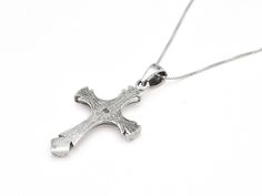 Vintage Cross Pendant made of Solid 925 Sterling Silver ☞ made to last. Matching Ring & Matching Earrings ☞ please ask me Details:• Silver Cross Necklace• Dimensions: Pendant Height 38mm, Width 20mm• Free Complimentary Chain• Solid 925 Sterling Silver SKU TE-112 Sterling Silver White Gold Cross Pendant, Tarnish Resistant Sterling Silver Cross Jewelry, Sterling Silver Cross Jewelry In White Gold, White Gold Sterling Silver Cross Jewelry, Silver Polished Cross Pendant, Silver Cross Pendant Jewelry With Polished Finish, Silver Cross Jewelry With Diamond Cut, Silver Tarnish-resistant Cross Pendant Jewelry, Nickel-free White Gold Cross Jewelry