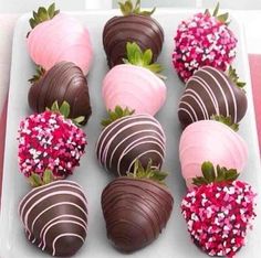 chocolate covered strawberries are arranged on a plate