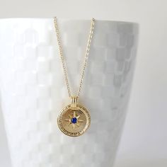 "Beautiful and lovely round medallion charm necklace. Made of navy blue CZ stone gold medallion charm with skinny chain. Simple and warm. Necklace will ship in a gift box. If you have any question, please feel free to contact me. Thanks :) ♥ Necklace length 15\"-20\" ♥ Pendant 3/4\" ♥ Gold plated over brass / Navy Blue Cubic Zirconia ♥ Delivery Time Fast shipping within 1 - 3 days ♥ See more Rudiana Accessories Rudiana.etsy.com" Blue Medallion Locket Necklace As Gift, Compass Design Round Pendant Locket Necklace As Gift, Compass Design Locket Necklace As A Gift, Blue Round Locket Necklace, Medallion Necklace With Compass Design For Gift, Round Pendant Medallion Necklace With Compass Design For Gift, Gift Medallion Necklace With Compass Design, Gift Compass Design Round Pendant Medallion Necklace, Compass Design Medallion Necklace Gift